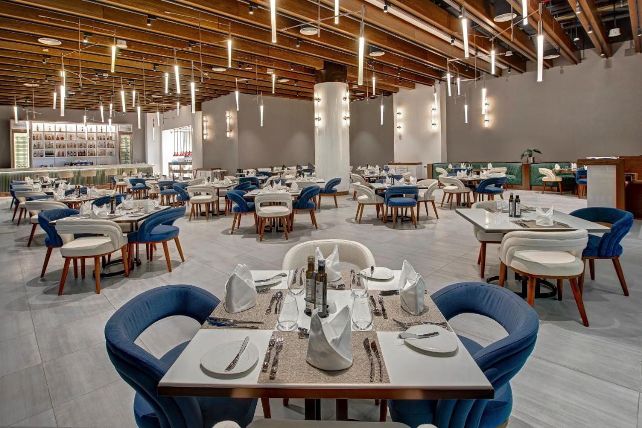 Royal M Al Aqah Beach Resort By Gewan Exterior foto The restaurant