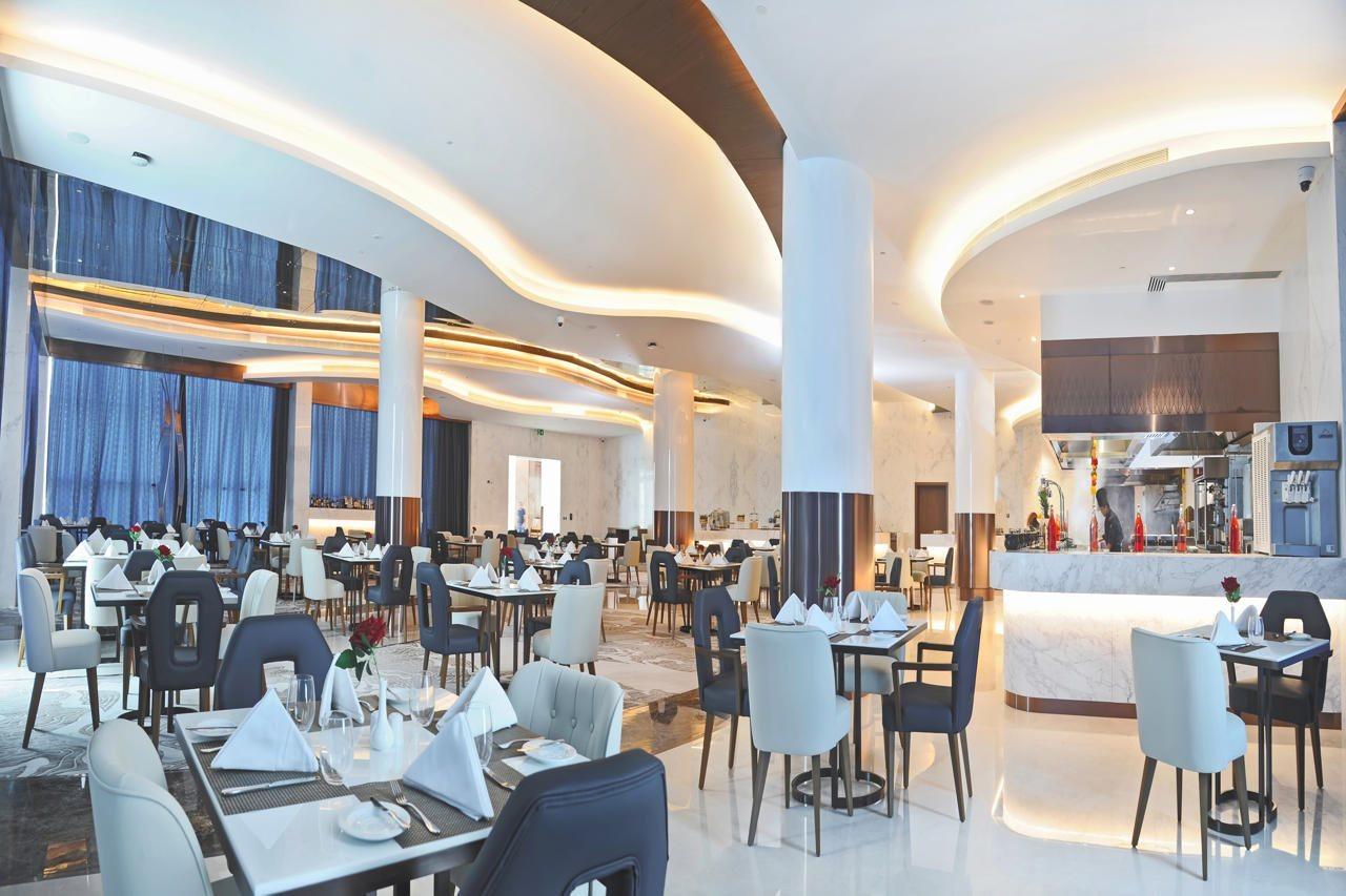 Royal M Al Aqah Beach Resort By Gewan Exterior foto The restaurant